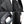 Dark gray compact waterproof crossbody bag close-up of textured fabric and zipper pulls