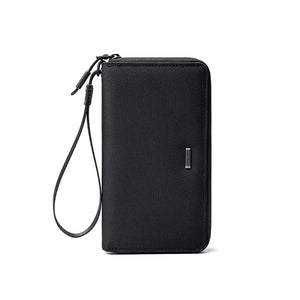 Men's long clutch wallet with wrist strap, textured black fabric and zipper closure
