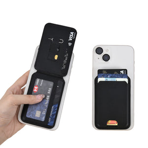 Black leather MagSafe card holder wallet opened to show card slots, with phone shown