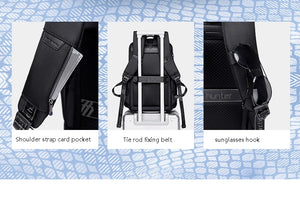 Black backpack detail: shoulder strap pocket, tie rod fixing belt, and sunglasses hook.