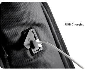 USB charging port detail on waterproof roll-top backpack