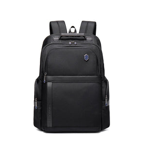 Black waterproof travel backpack with top handle, front zip pocket, and padded shoulder straps