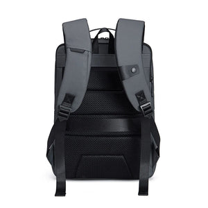 Back view of black backpack with padded shoulder straps and ventilated mesh panel