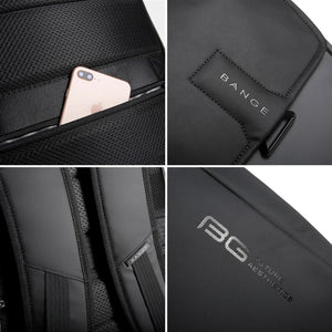 Front pocket detail with BANGE patch and zip pull on grey roll-top backpack