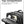 Black backpack top compartment with zipper and padded phone storage