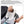 Black travel backpack with mesh shoe compartment open and a pair of white sneakers stored inside
