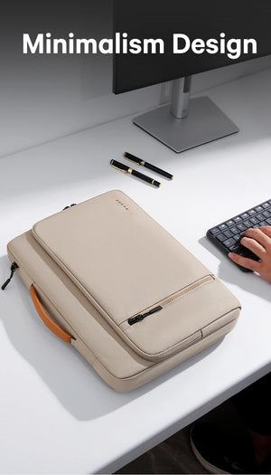 Beige laptop bag with brown side accents and zip front, compact design