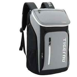 Grey and black waterproof travel backpack with front zip pocket and side strap