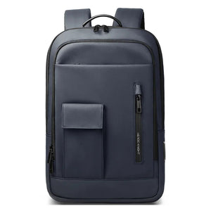 Lightweight waterproof compact backpack in blue with front zip pocket and top handle loop.