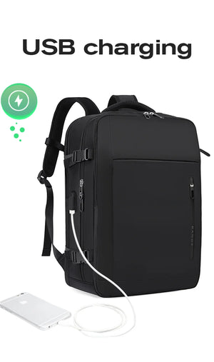 Black backpack with visible USB charging cable and front zip pockets