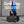 Black duffle bag worn crossbody by a person