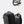 Waterproof backpack side view with fixed belt strap, front zip pocket, and padded back panel