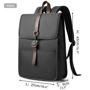 Black commuter backpack with top flap, front pocket panel, and crossbody shoulder strap