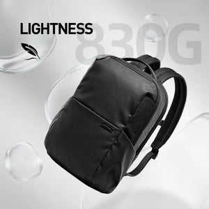 Black compact laptop backpack angled view with front panel stitching and side handle