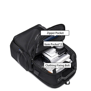 Black waterproof backpack open to show interior compartments and zipper pocket for accessories