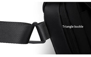 Black triangle buckle strap attachment on compact cross-body bag