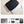 Black laptop sleeve with textured quilted padding on desk, front zipper visible.