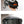 Black tech storage bag with cables and devices packed inside