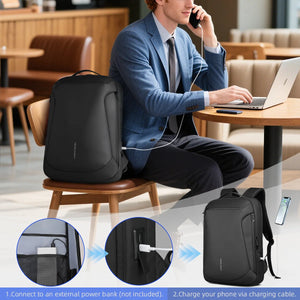 Black laptop travel backpack on a chair with charging cable access and side storage
