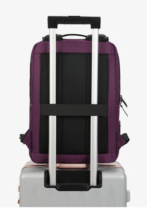 Purple backpack with front carry handle and trolley pass-through strap
