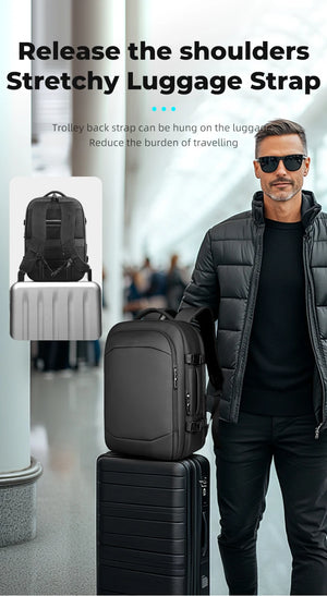 Black travel backpack with stretchy luggage strap to attach to rolling luggage