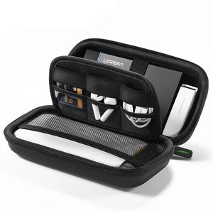Black carrying case with UGREEN branding containing electronic devices on a white background