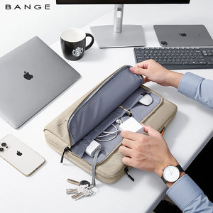 Beige laptop bag opened to reveal organizer pockets and padded divider