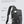 Dark gray compact waterproof crossbody bag with front pocket, side pocket, and crossbody strap