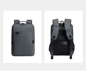 Grey waterproof travel backpack shown from front and back with padded straps