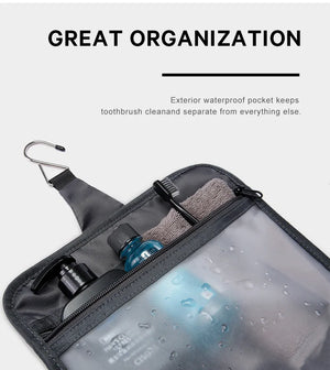 Gray waterproof toiletries bag interior with clear pocket, elastic holder, and zipper