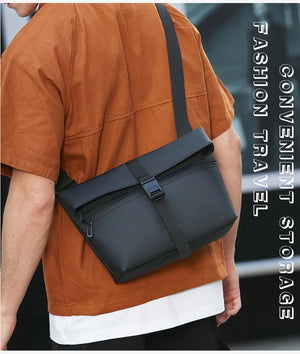 Black crossbody messenger bag with adjustable buckle strap and front flap closure