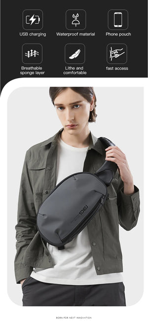 Black sling crossbody bag with quick-access front pocket and phone pouch