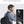 Black waterproof backpack with USB charging port and headphone cable connection