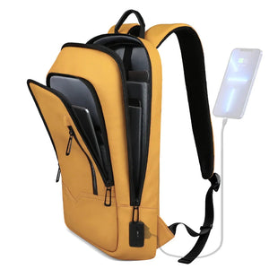 Yellow and black compact waterproof backpack with USB charging port and charging cable