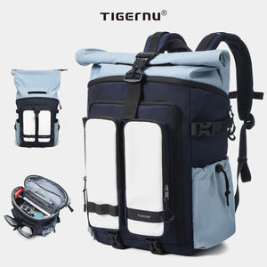 Blue waterproof travel backpack with front zip pockets and padded shoulder straps.