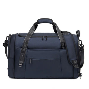 Blue duffle and sports bag with front zipper panel, top handle, and side straps