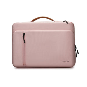 Pink laptop bag with brown top handle and front zippered pocket