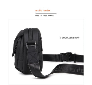 Black crossbody bag with side strap loop and adjustable shoulder strap with buckle