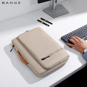 Beige laptop bag closed with front zipper pocket and top handle
