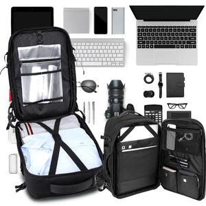 Black waterproof travel backpack open with inner compartments and zippered pockets