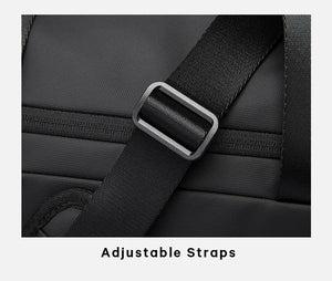 Black waterproof duffle bag adjustable strap with metal D-ring and stitched webbing