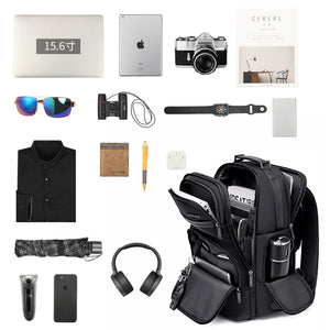 Black travel backpack shown with multiple accessories for compact daily and travel storage.