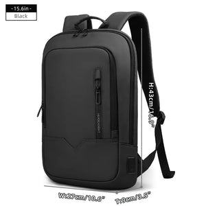 Black compact waterproof backpack with front pocket, side strap, and USB port panel