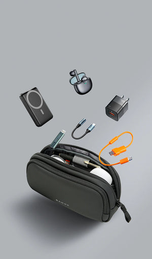 Black tech storage bag with open zipper and accessory compartments