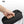 Black tech storage bag held in hand, compact zippered case with wrist strap