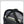 Black backpack interior showing padded 15.6-inch laptop sleeve and strap