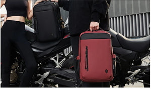 Red multifunction travel backpack with front zipper panel and padded back