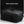 Black waterproof travel backpack with front buckles and water-resistant top surface