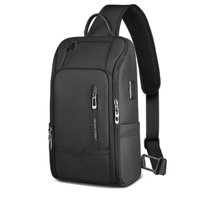 Compact black crossbody bag with front zip pockets and adjustable shoulder strap