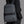 Person wearing a gray backpack with 'arctic hunter' branding on a gray background